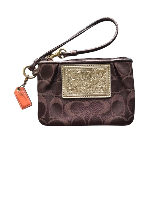 Coach Handbags - Coach Poppy Brown Signature Wristlet with Gold Patch and Orange Charm